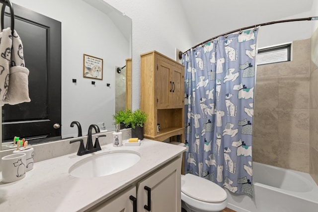 bathroom featuring toilet, shower / tub combo, and vanity