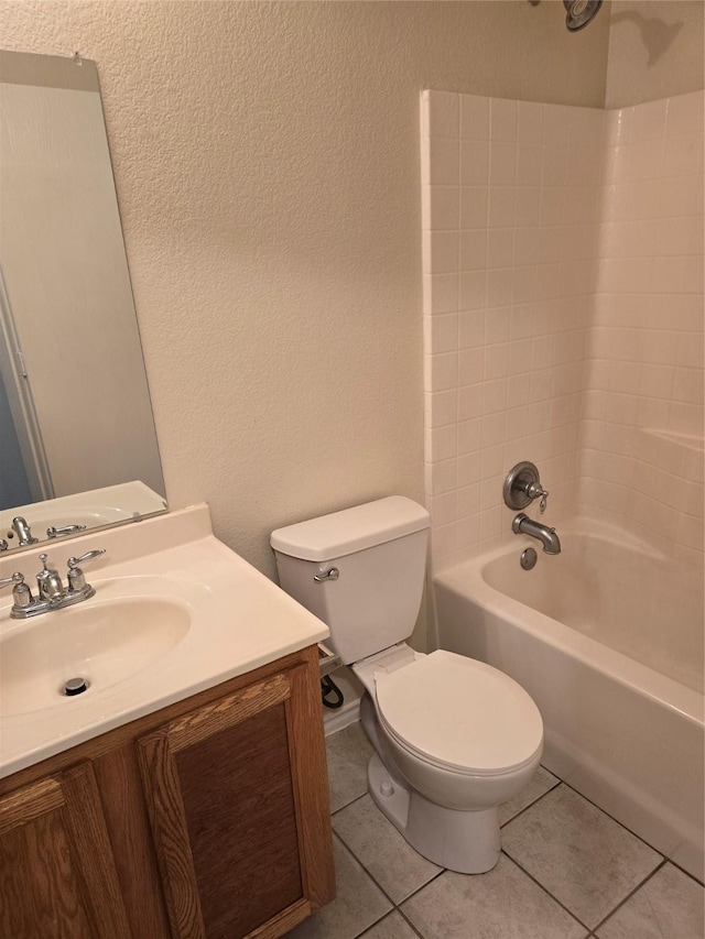 full bath with a textured wall, toilet, shower / tub combination, tile patterned flooring, and vanity