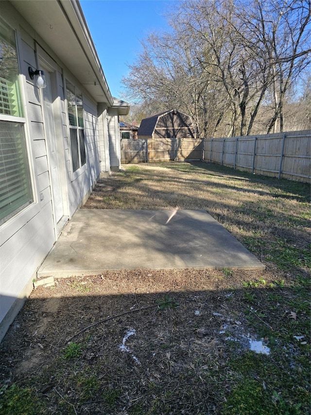 view of yard featuring a fenced backyard and a patio