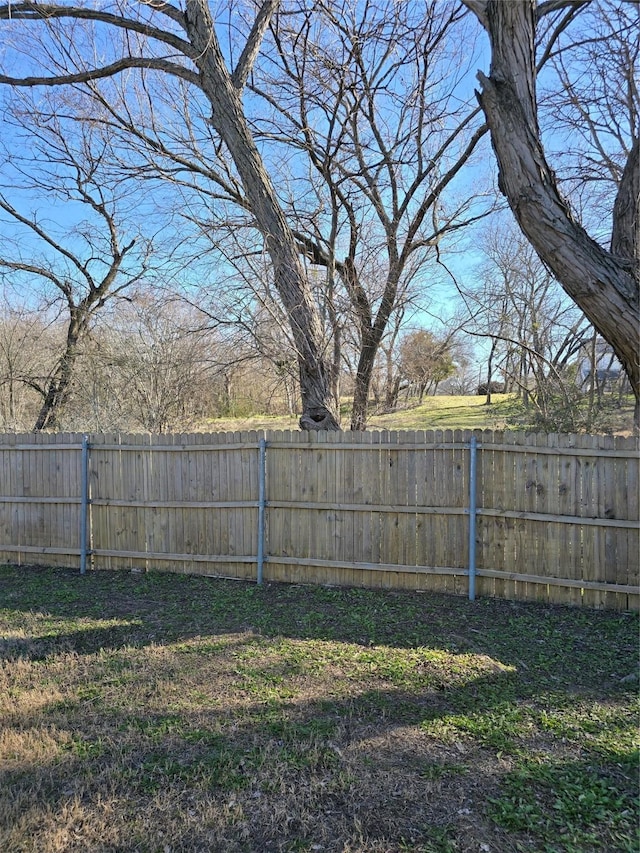 view of yard with fence