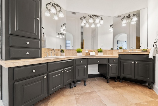 bathroom featuring vanity, visible vents, and tile patterned floors