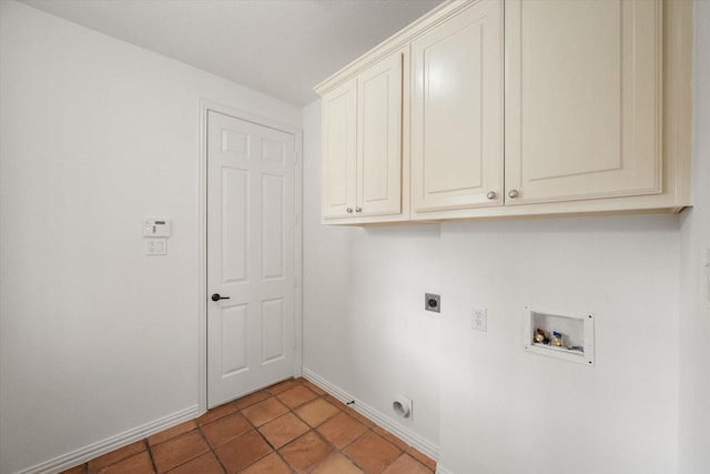 laundry room featuring washer hookup, light tile patterned floors, cabinet space, hookup for an electric dryer, and baseboards