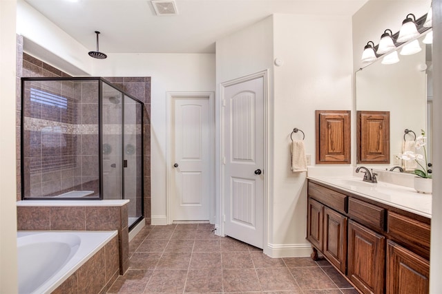 1005 Brendan Dr, Little Elm, TX 75068 - full bathroom featuring a shower stall, vanity, a bath, and baseboards
