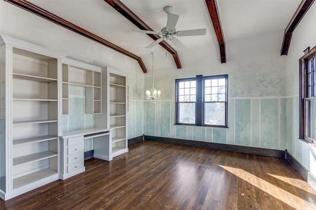 spare room with dark wood-style floors, built in desk, beamed ceiling, and ceiling fan with notable chandelier