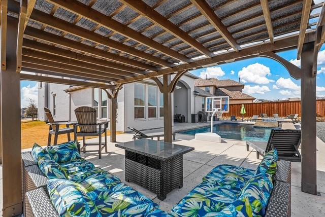 rear view of property with a patio, a fenced backyard, a yard, and a pergola