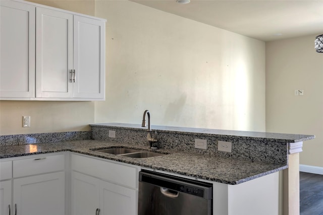 kitchen featuring a sink, white cabinets, and stainless steel dishwasher