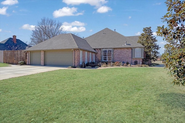 view of front of house featuring an attached garage, brick siding, fence, driveway, and a front yard