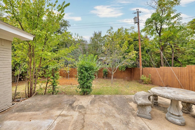 view of patio with a fenced backyard