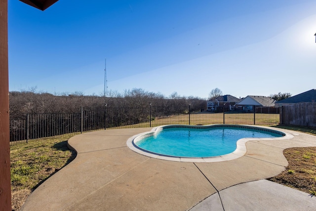 view of swimming pool featuring a patio area, a fenced backyard, and a fenced in pool