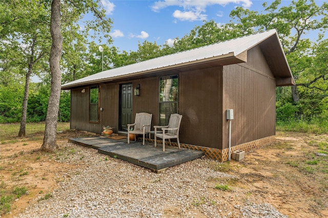 3113 Rock Creek Rd, Mineral Wells, TX 76067 - exterior space with an outbuilding and metal roof
