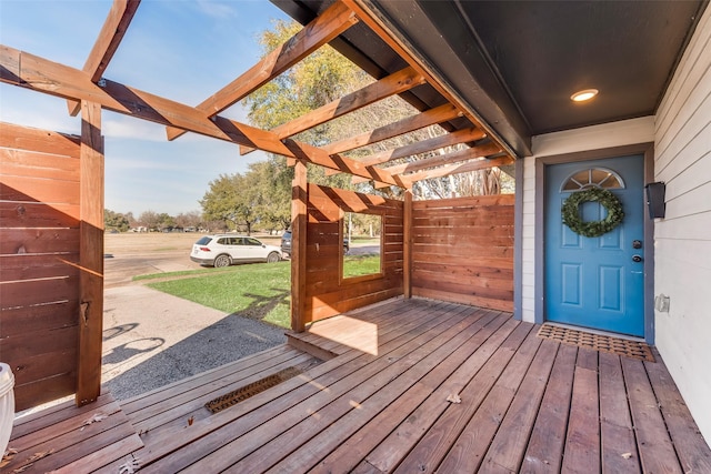 wooden deck with a pergola