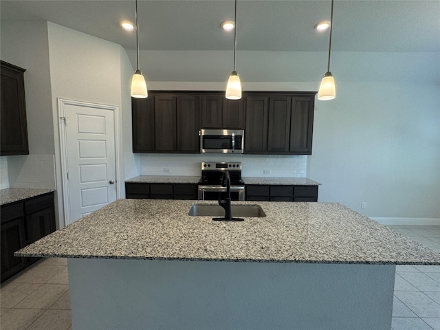 1433 Eagle Nest Dr, Pelican Bay, TX 76020 - kitchen featuring stainless steel appliances, decorative backsplash, light stone countertops, light tile patterned floors, and a sink