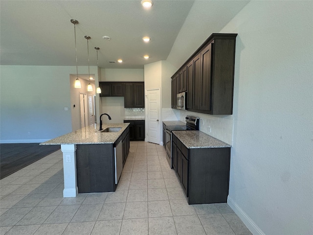 1433 Eagle Nest Dr, Pelican Bay, TX 76020 - kitchen with appliances with stainless steel finishes, a sink, tasteful backsplash, light stone countertops, and recessed lighting