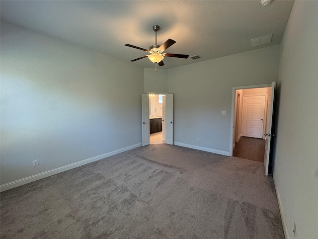 1433 Eagle Nest Dr, Pelican Bay, TX 76020 - unfurnished bedroom featuring carpet, baseboards, ensuite bathroom, and ceiling fan