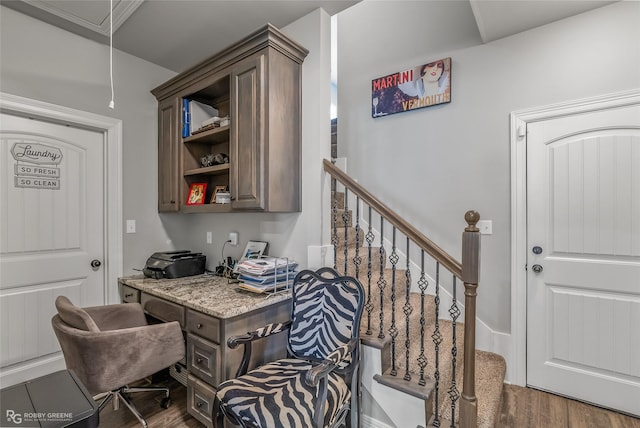 interior space featuring attic access and dark wood-style flooring