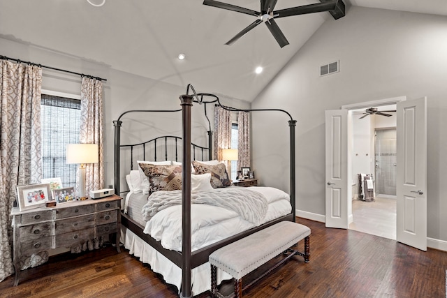 bedroom featuring high vaulted ceiling, dark wood-style flooring, visible vents, baseboards, and a ceiling fan