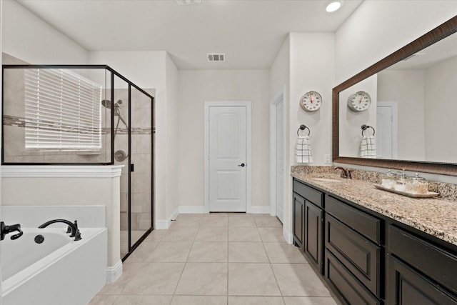 3204 Wimberley Ln, Rockwall, TX 75032 - full bathroom with a shower stall, tile patterned floors, vanity, and a bath