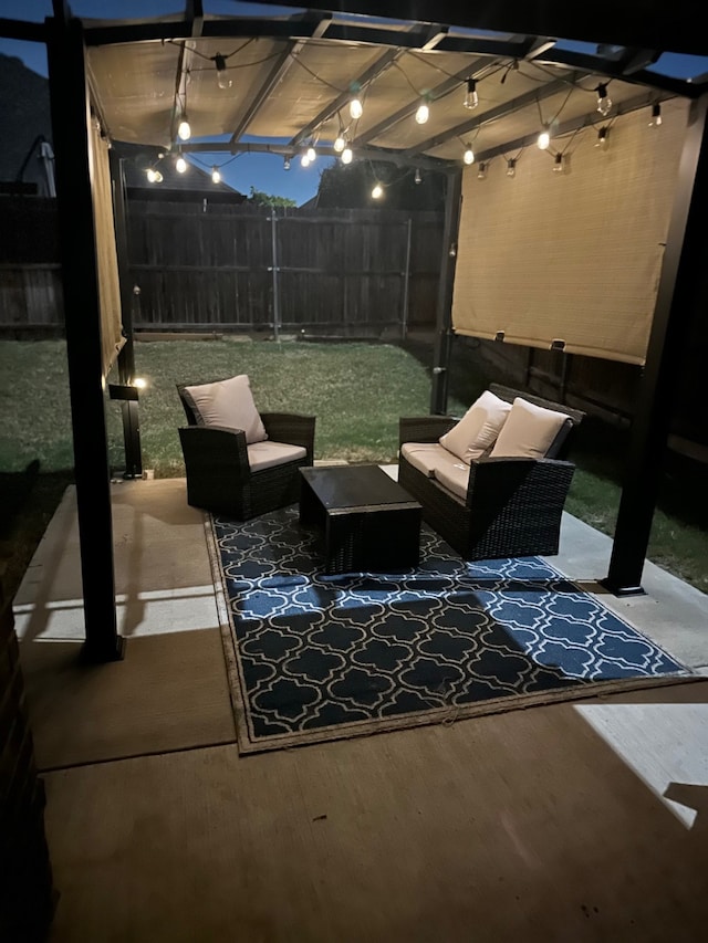 view of patio featuring a pergola, fence, and an outdoor hangout area