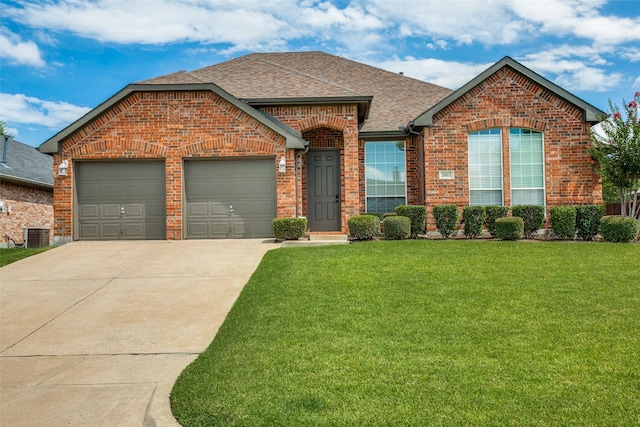 view of front of property with an attached garage, brick siding, driveway, roof with shingles, and a front lawn