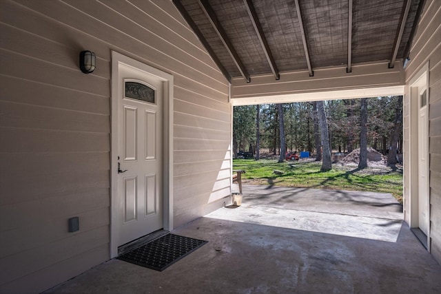 property entrance with a patio