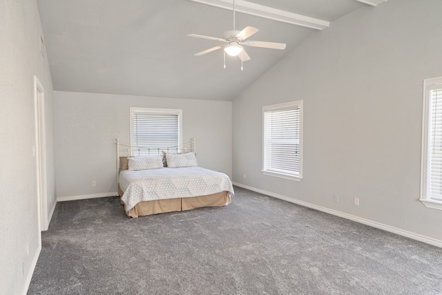 unfurnished bedroom with a ceiling fan, beam ceiling, dark carpet, and baseboards