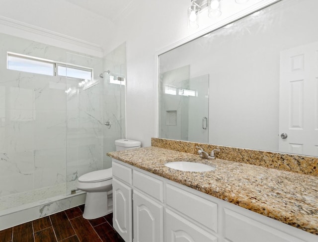 full bath with toilet, a marble finish shower, vanity, and wood tiled floor