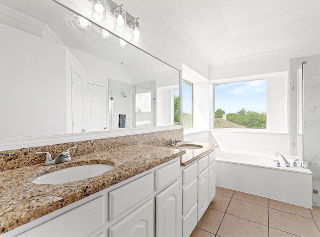 full bathroom featuring ornamental molding, a garden tub, tile patterned flooring, a shower stall, and a sink