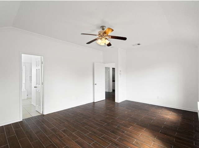 unfurnished room with visible vents, baseboards, ceiling fan, wood tiled floor, and vaulted ceiling