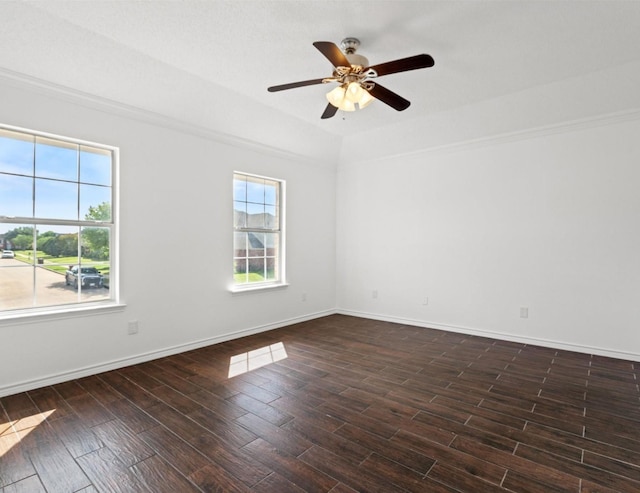 unfurnished room featuring ceiling fan, baseboards, vaulted ceiling, and dark wood-style flooring