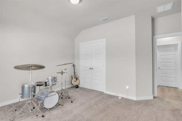 playroom with carpet flooring, visible vents, and baseboards