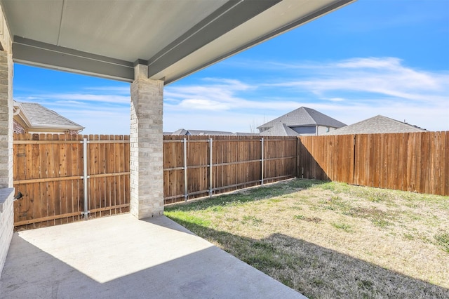 view of yard featuring a fenced backyard and a patio