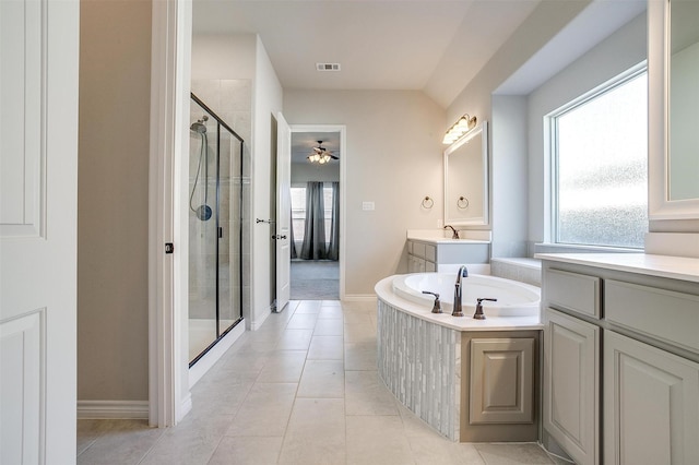 bathroom with a garden tub, vanity, visible vents, a shower stall, and tile patterned floors