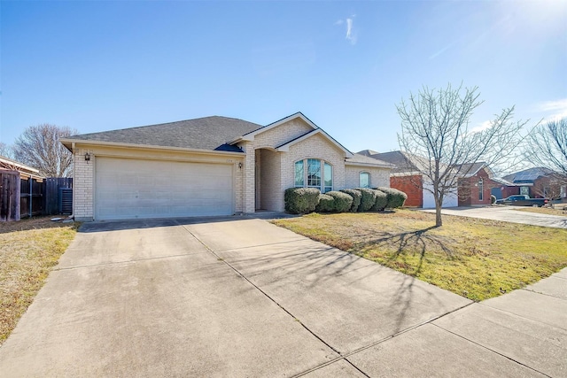 single story home with a garage, brick siding, fence, driveway, and a front lawn