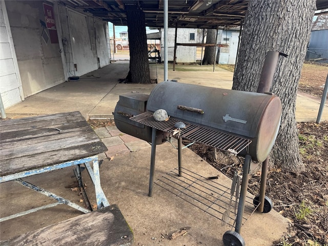 view of patio / terrace with a carport and area for grilling