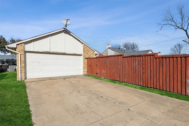 detached garage with cooling unit and fence