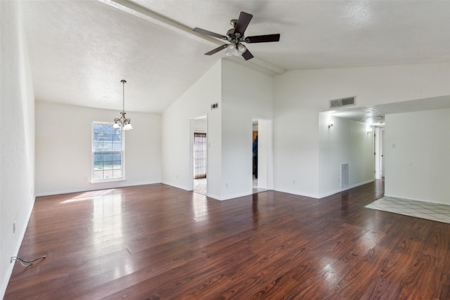 unfurnished room featuring ceiling fan with notable chandelier, lofted ceiling, visible vents, and wood finished floors