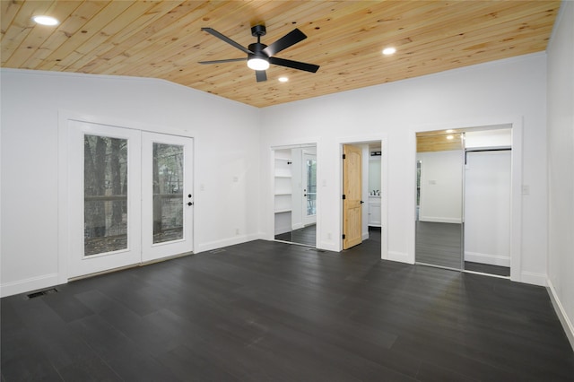 interior space featuring dark wood-type flooring, lofted ceiling, and wood ceiling