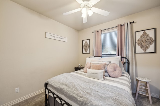 carpeted bedroom with a ceiling fan and baseboards