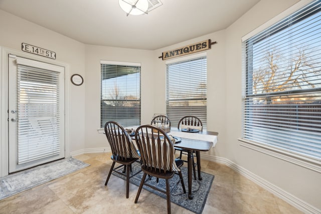 dining room with baseboards