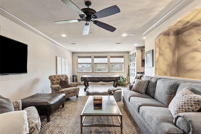 living room with billiards, a textured ceiling, visible vents, and crown molding