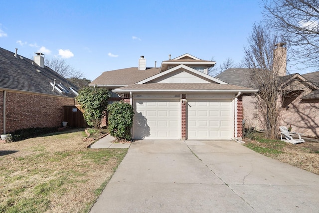 view of front of property with driveway, roof with shingles, a garage, and brick siding