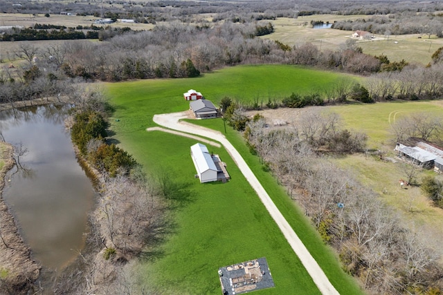 drone / aerial view featuring a water view and a rural view