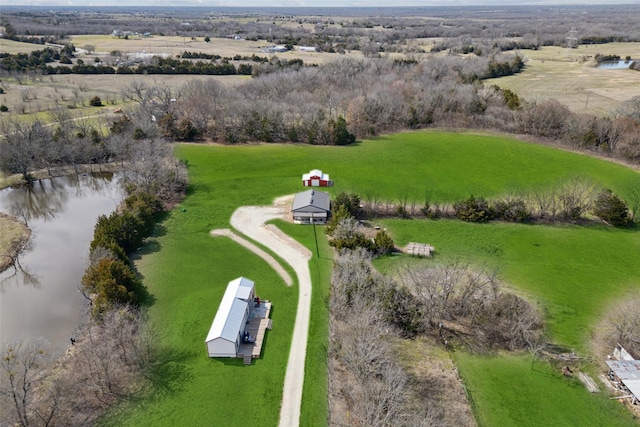 aerial view featuring a rural view and a water view