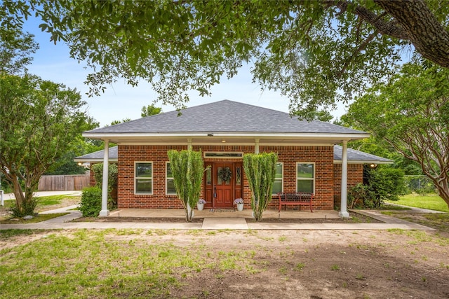 230 Holder Trl, Mckinney, TX 75071 - bungalow-style house with roof with shingles, brick siding, and a porch