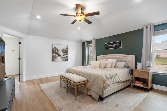 bedroom with light wood finished floors, baseboards, lofted ceiling, ceiling fan, and recessed lighting