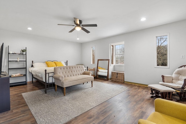 bedroom featuring baseboards, dark wood-type flooring, a ceiling fan, and recessed lighting