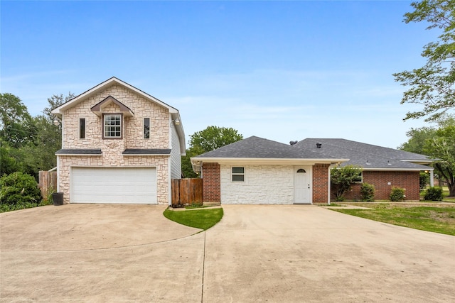 230 Holder Trl, Mckinney, TX 75071 - view of front of property with stone siding, roof with shingles, concrete driveway, and a garage