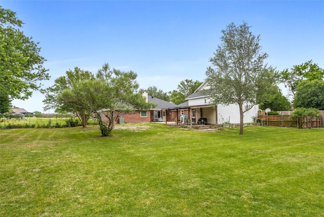 230 Holder Trl, Mckinney, TX 75071 - view of yard featuring a patio area
