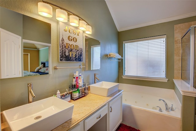 full bath with ornamental molding, a wealth of natural light, and a sink