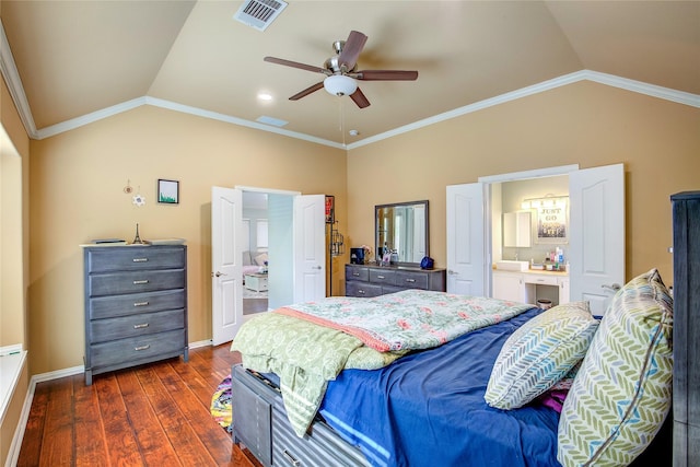 bedroom featuring lofted ceiling, crown molding, visible vents, and dark wood-style flooring